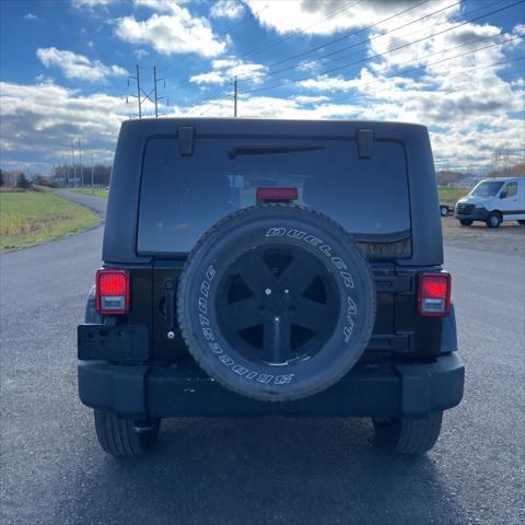 used 2011 Jeep Wrangler Unlimited car, priced at $12,995