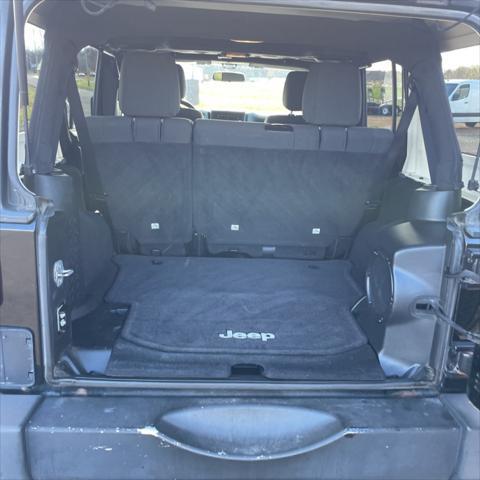 used 2011 Jeep Wrangler Unlimited car, priced at $12,995