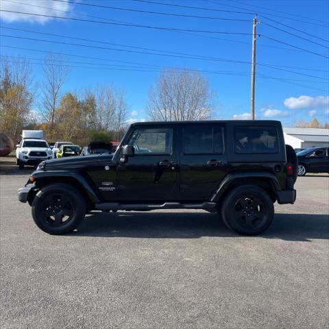 used 2011 Jeep Wrangler Unlimited car, priced at $12,995