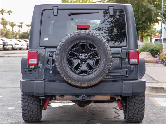 used 2018 Jeep Wrangler JK Unlimited car, priced at $19,355