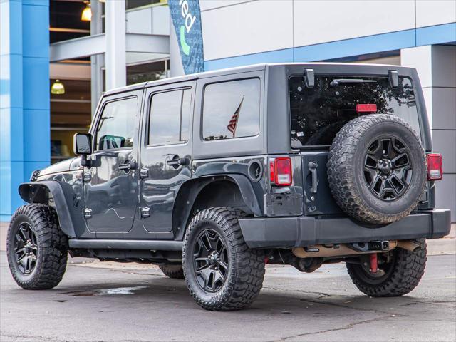 used 2018 Jeep Wrangler JK Unlimited car, priced at $19,355