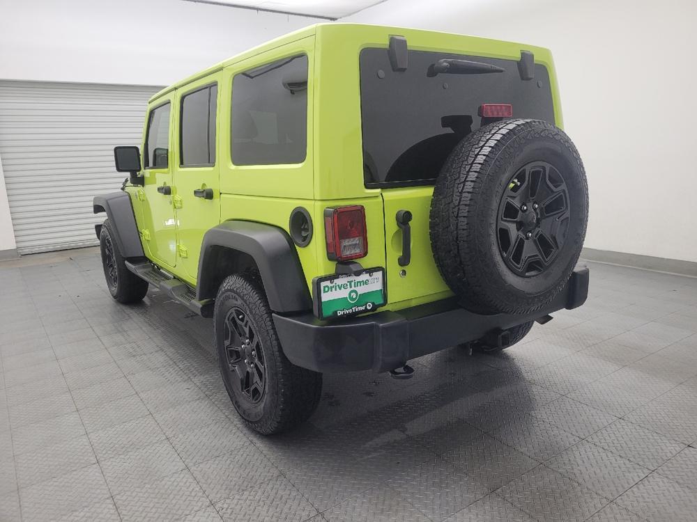 used 2016 Jeep Wrangler Unlimited car, priced at $20,395