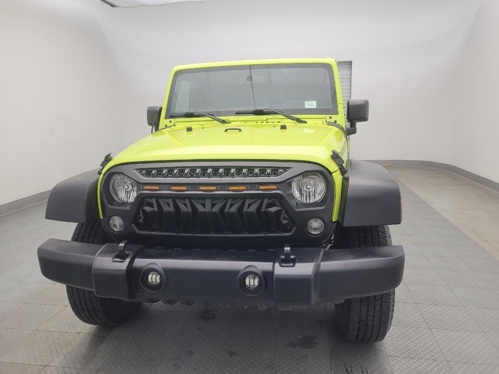 used 2016 Jeep Wrangler Unlimited car, priced at $20,395