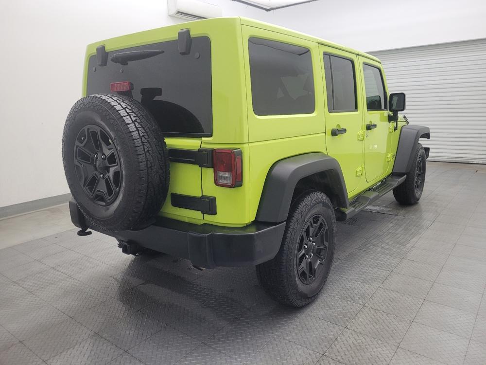 used 2016 Jeep Wrangler Unlimited car, priced at $20,395