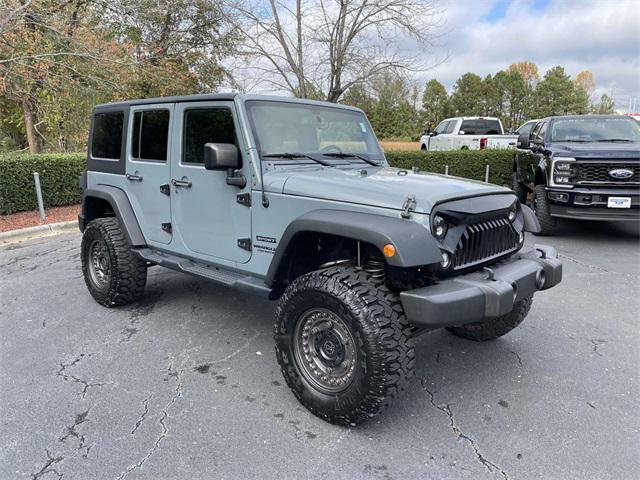 used 2015 Jeep Wrangler Unlimited car, priced at $19,690