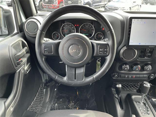 used 2015 Jeep Wrangler Unlimited car, priced at $19,690