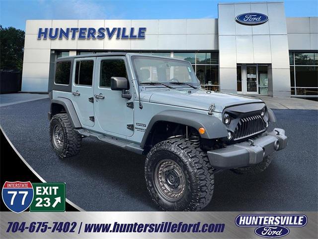 used 2015 Jeep Wrangler Unlimited car, priced at $19,690