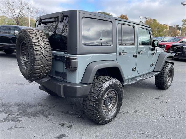 used 2015 Jeep Wrangler Unlimited car, priced at $19,690