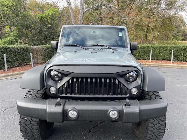 used 2015 Jeep Wrangler Unlimited car, priced at $19,690