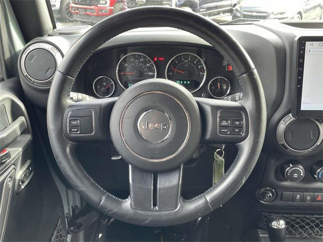 used 2015 Jeep Wrangler Unlimited car, priced at $19,690