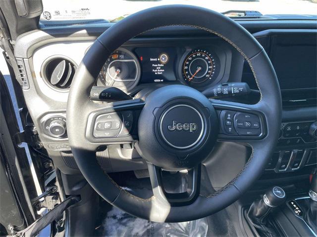 used 2024 Jeep Wrangler car, priced at $28,472