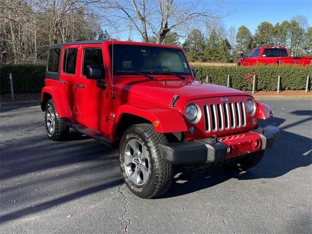 used 2018 Jeep Wrangler JK Unlimited car, priced at $24,939