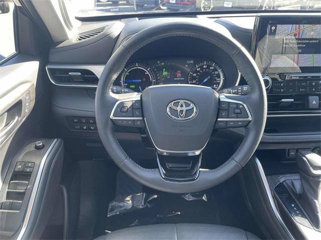 used 2021 Toyota Highlander Hybrid car, priced at $34,832