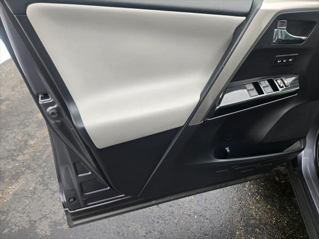 used 2018 Toyota RAV4 Hybrid car, priced at $24,900