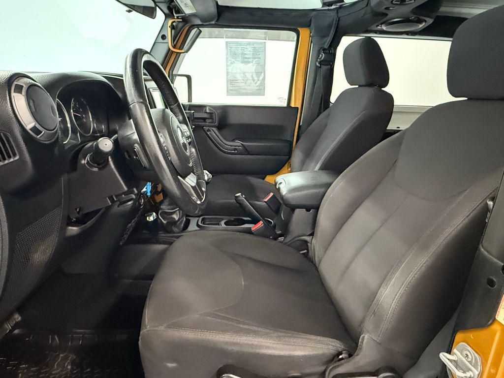 used 2014 Jeep Wrangler car, priced at $13,574