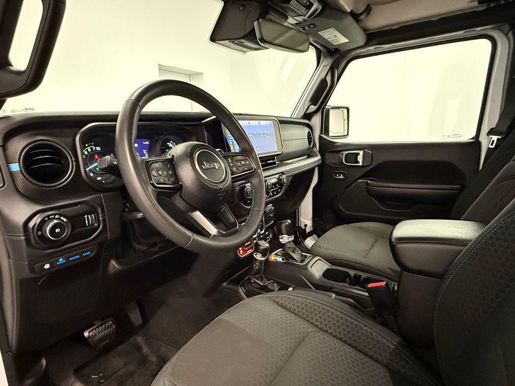 used 2024 Jeep Wrangler 4xe car, priced at $34,574