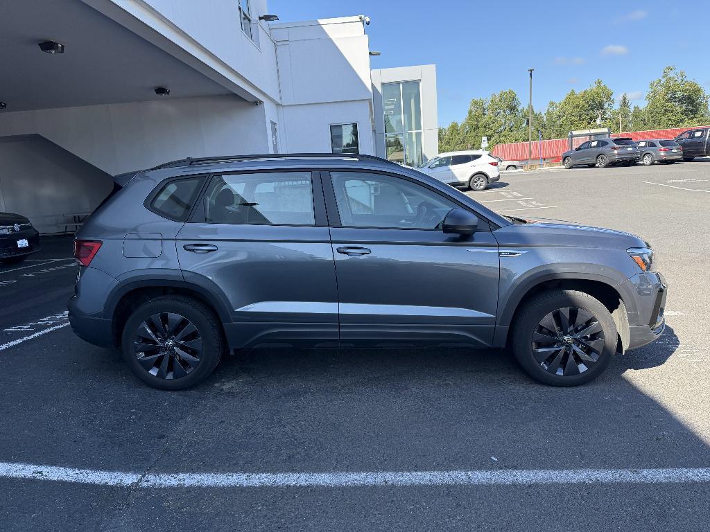 used 2023 Volkswagen Taos car, priced at $19,998