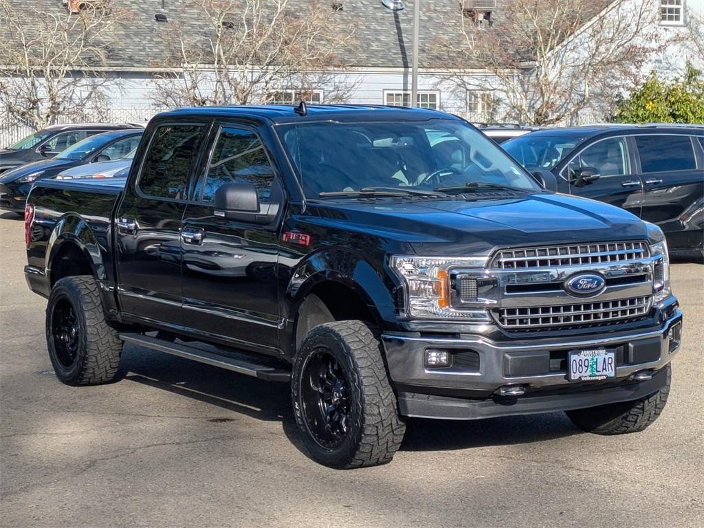 used 2018 Ford F-150 car, priced at $24,015