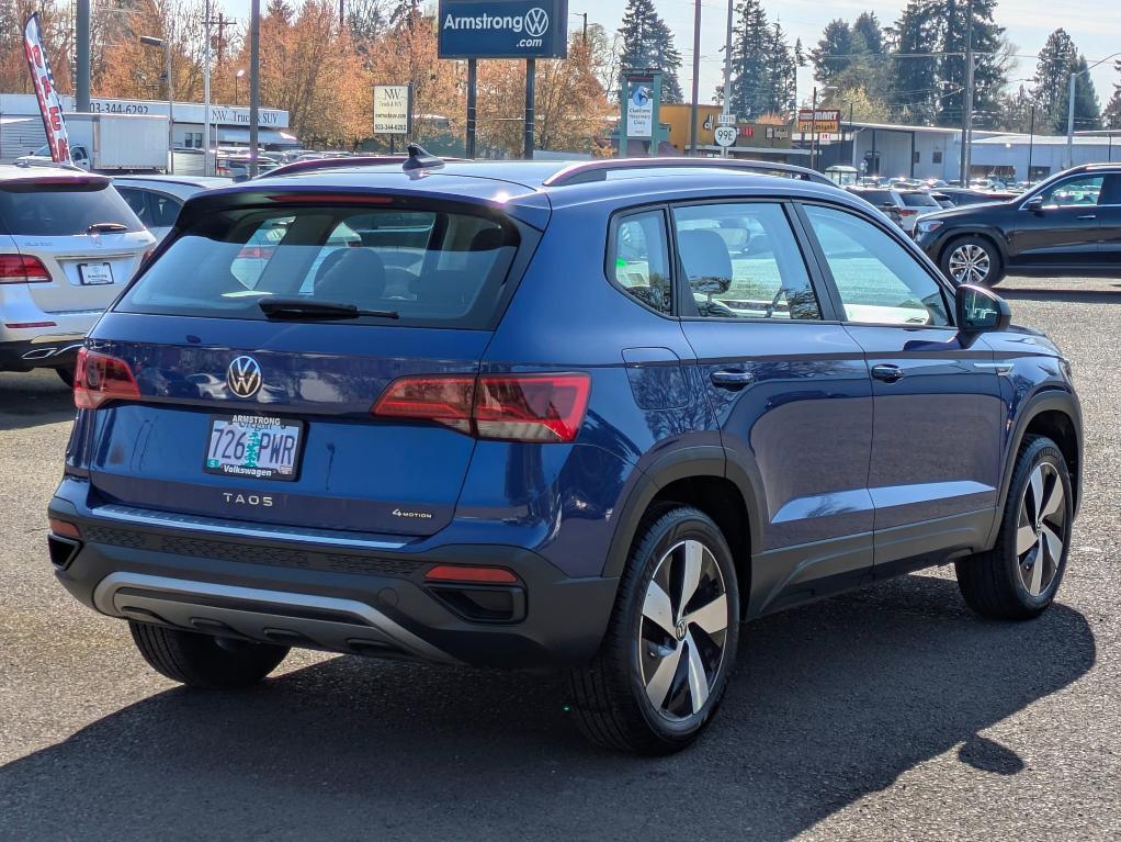 used 2023 Volkswagen Taos car, priced at $28,000