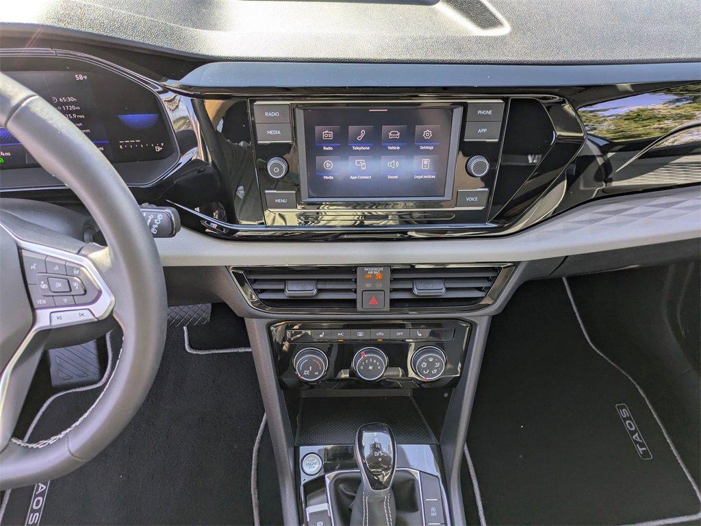 used 2023 Volkswagen Taos car, priced at $23,297