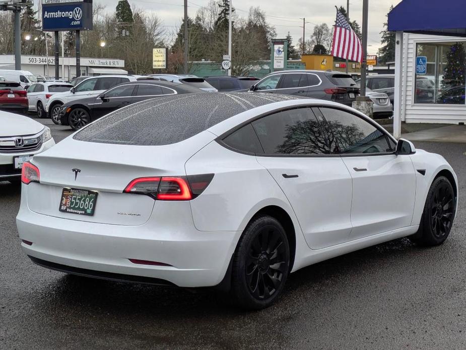 used 2022 Tesla Model 3 car, priced at $30,000