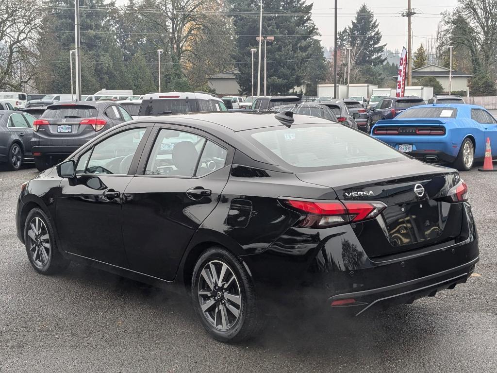 used 2021 Nissan Versa car, priced at $15,000