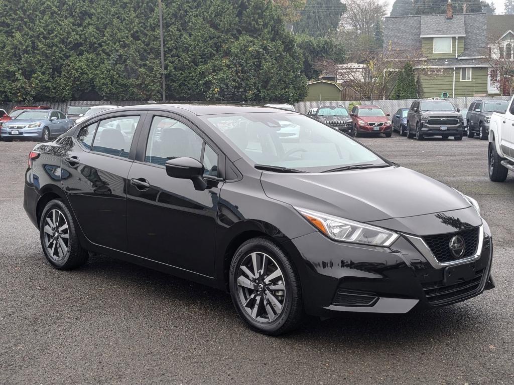 used 2021 Nissan Versa car, priced at $15,000