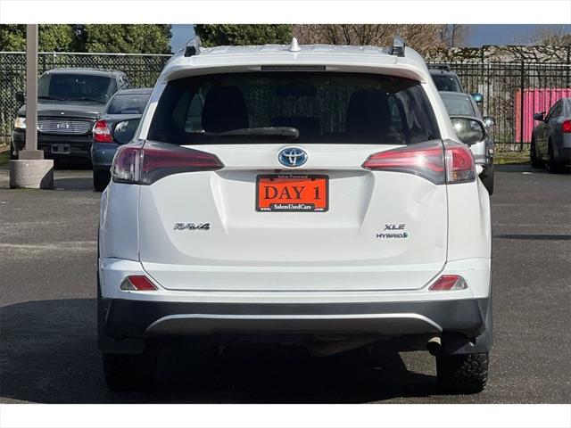 used 2018 Toyota RAV4 Hybrid car, priced at $15,999