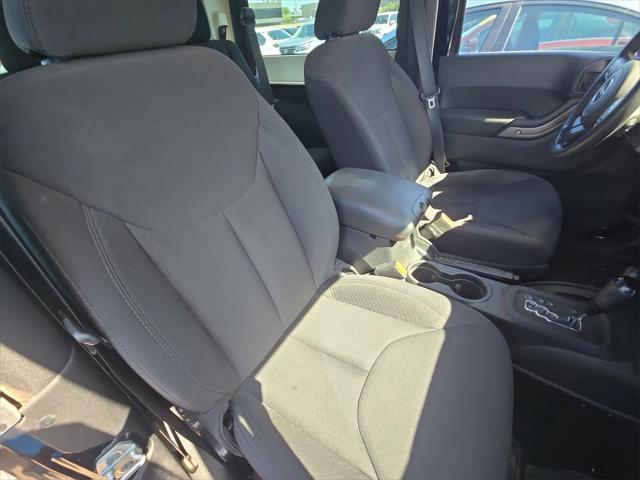 used 2014 Jeep Wrangler car, priced at $18,724