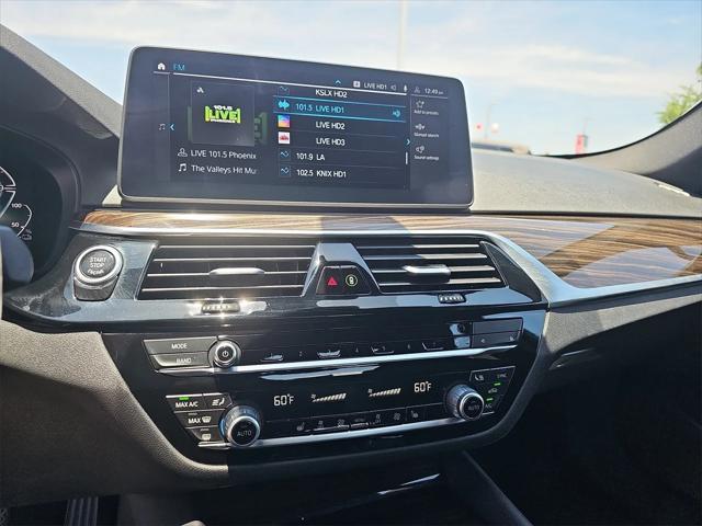 used 2023 BMW 530e car, priced at $30,694