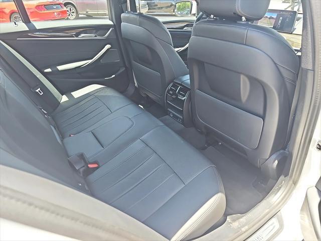 used 2023 BMW 530e car, priced at $30,694
