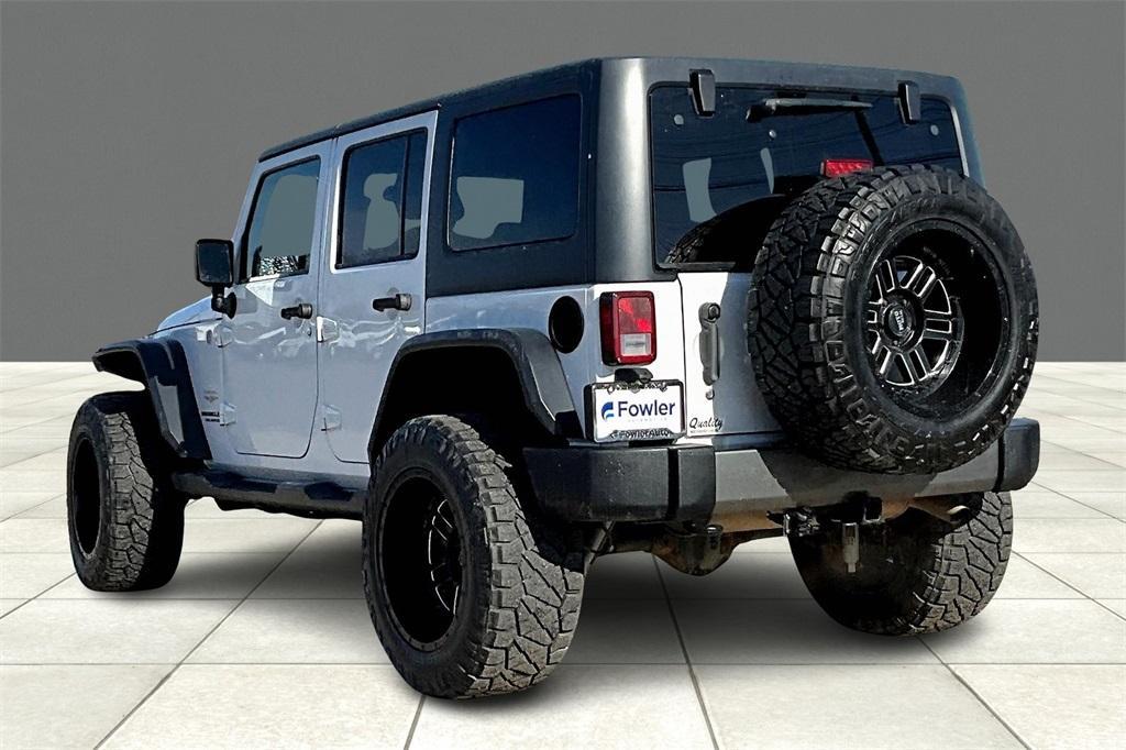 used 2013 Jeep Wrangler Unlimited car, priced at $16,627