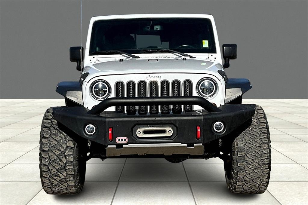 used 2013 Jeep Wrangler Unlimited car, priced at $16,627