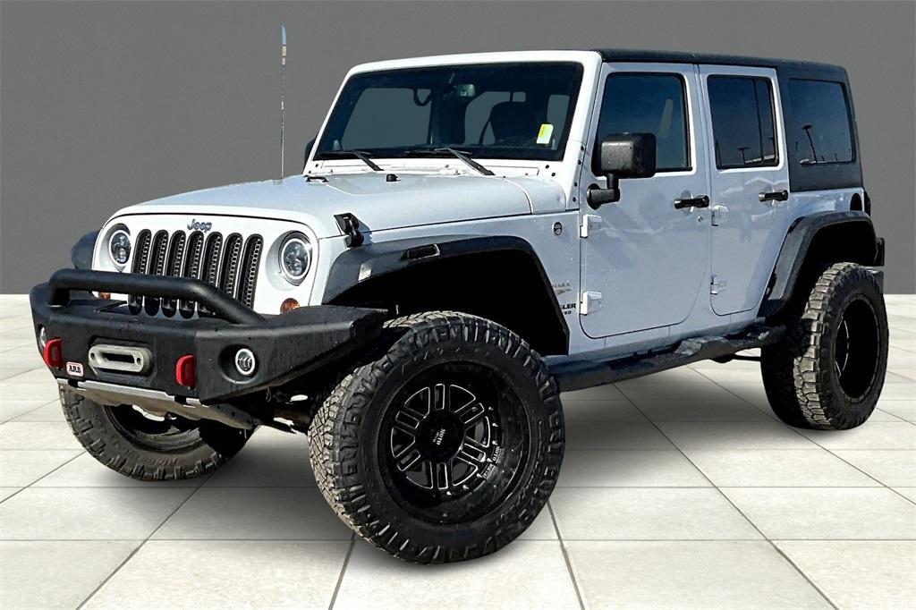 used 2013 Jeep Wrangler Unlimited car, priced at $16,627