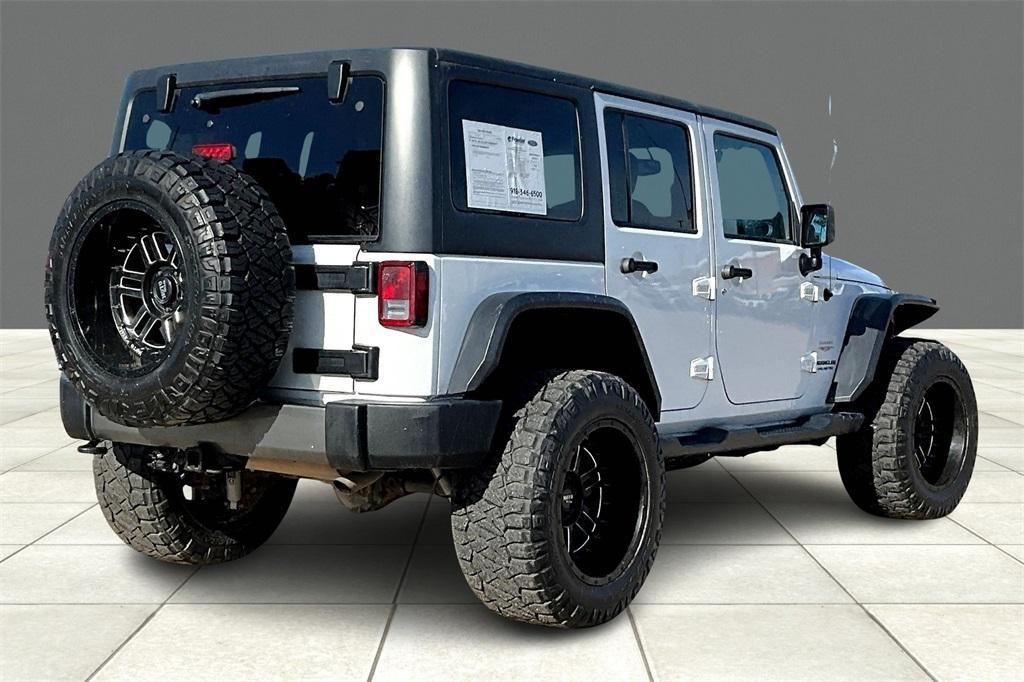 used 2013 Jeep Wrangler Unlimited car, priced at $16,627