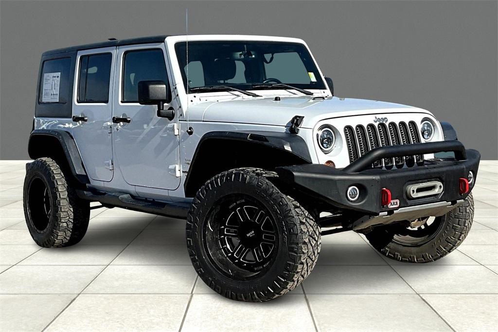 used 2013 Jeep Wrangler Unlimited car, priced at $16,627