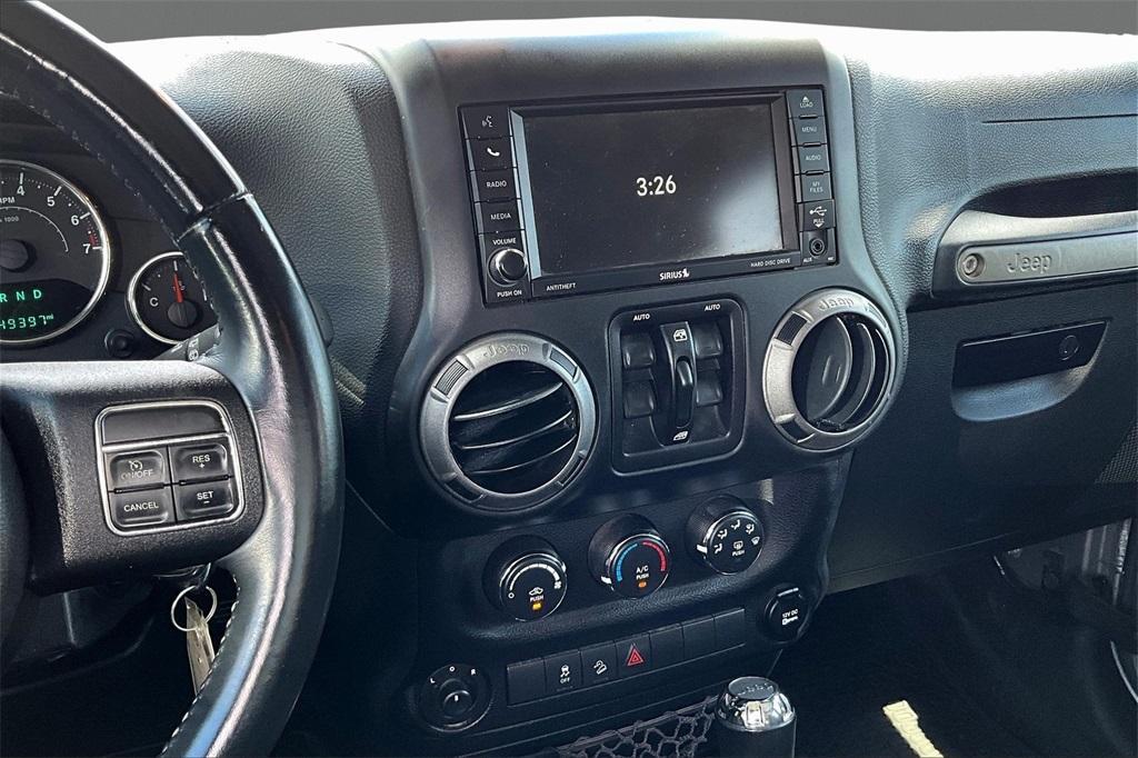 used 2015 Jeep Wrangler Unlimited car, priced at $15,836