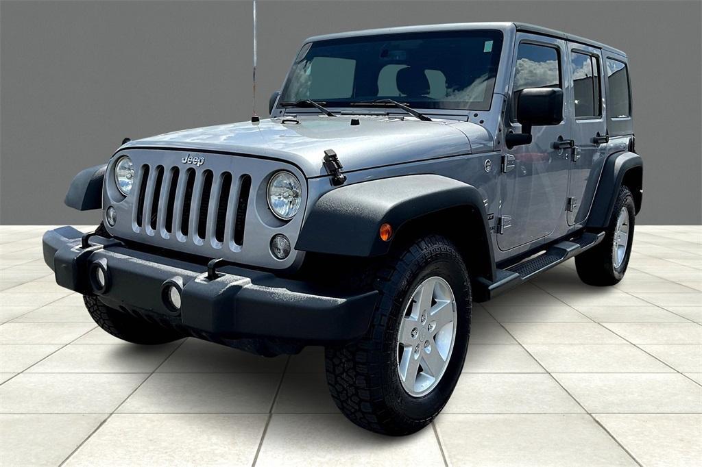 used 2015 Jeep Wrangler Unlimited car, priced at $16,277