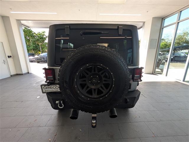 used 2015 Jeep Wrangler Unlimited car, priced at $16,932