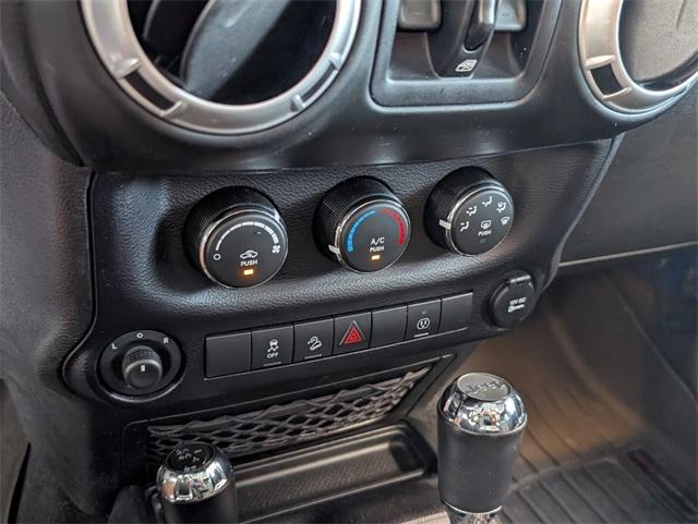 used 2015 Jeep Wrangler Unlimited car, priced at $22,975