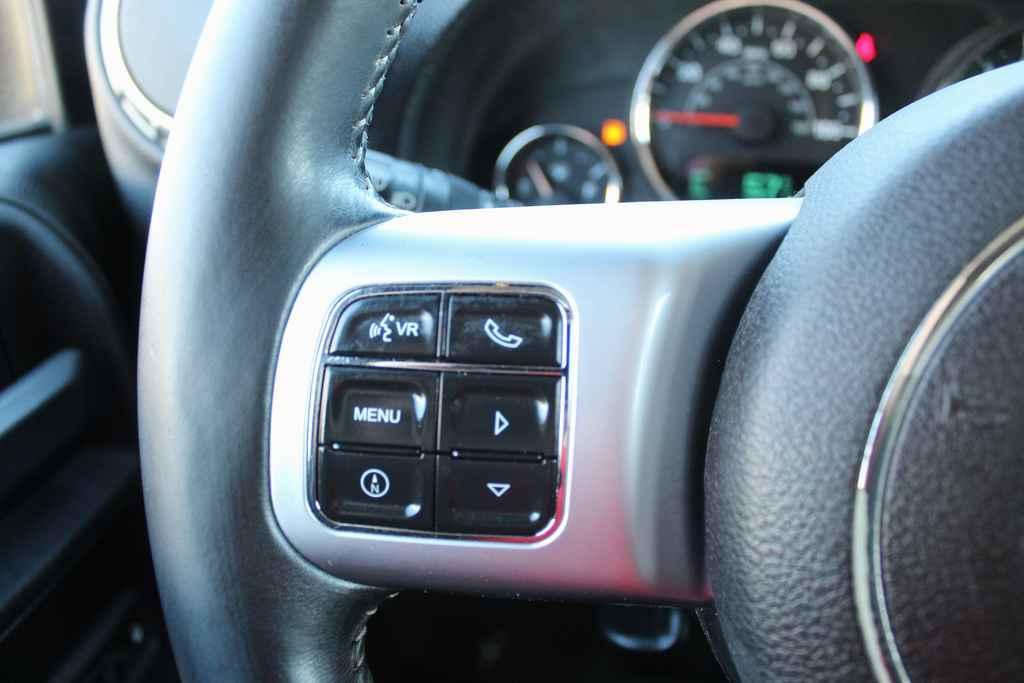 used 2015 Jeep Wrangler Unlimited car, priced at $17,290