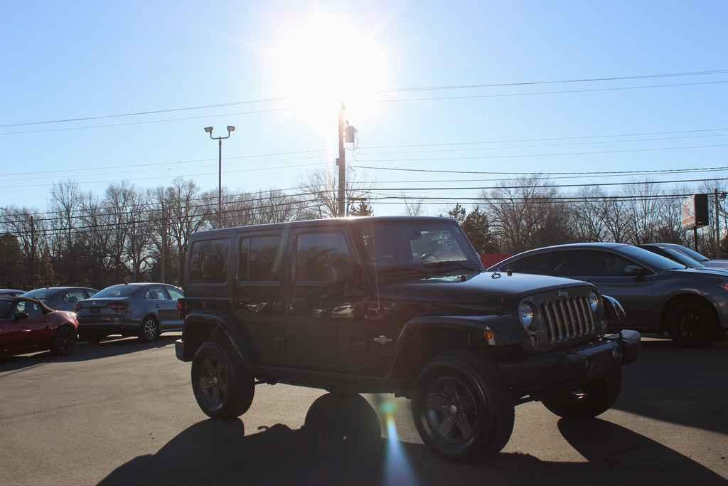 used 2015 Jeep Wrangler Unlimited car, priced at $17,290