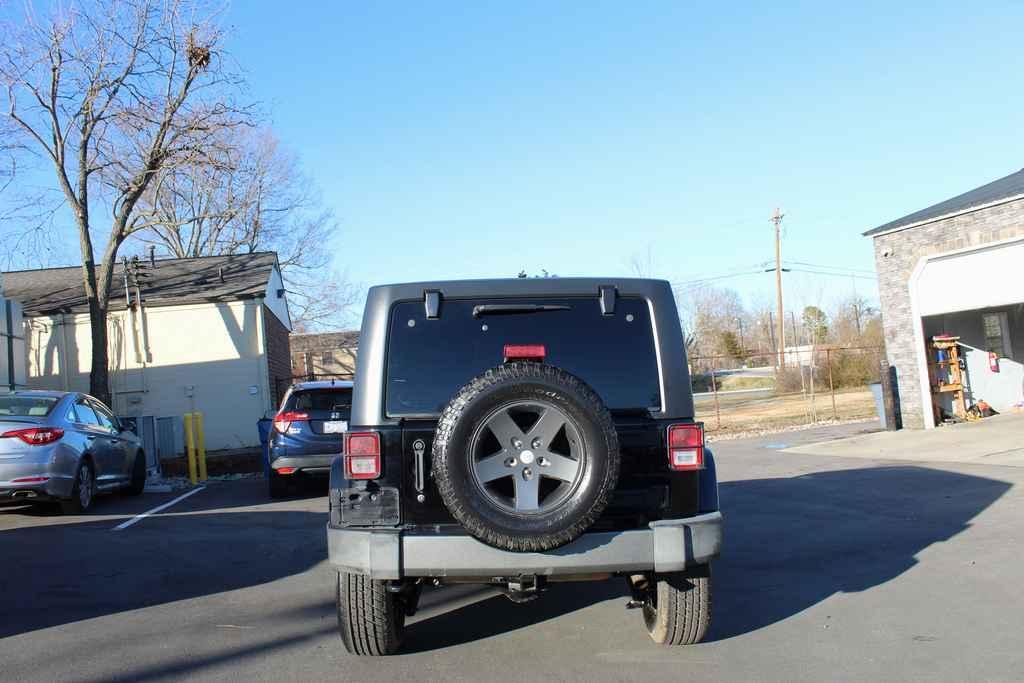 used 2015 Jeep Wrangler Unlimited car, priced at $17,290