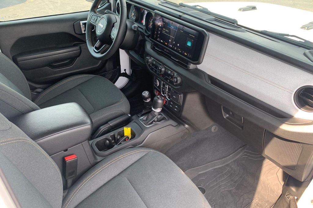 used 2024 Jeep Wrangler car, priced at $42,656