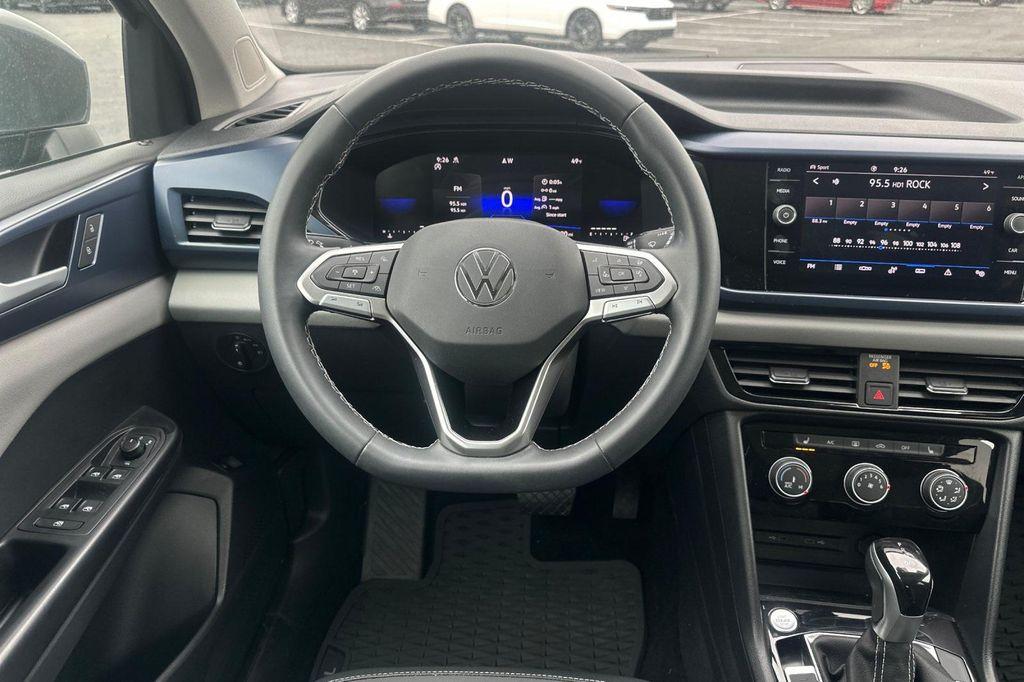 used 2023 Volkswagen Taos car, priced at $22,333