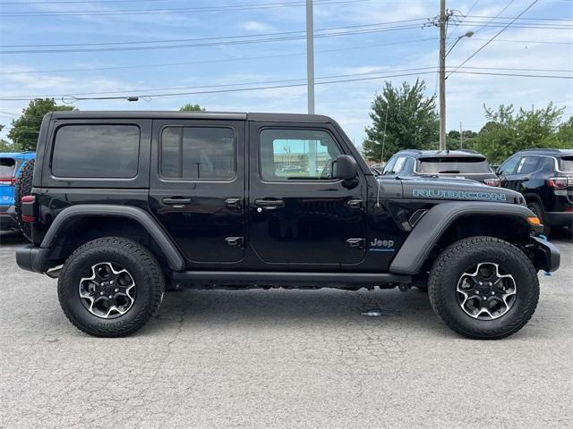 used 2023 Jeep Wrangler 4xe car, priced at $29,861