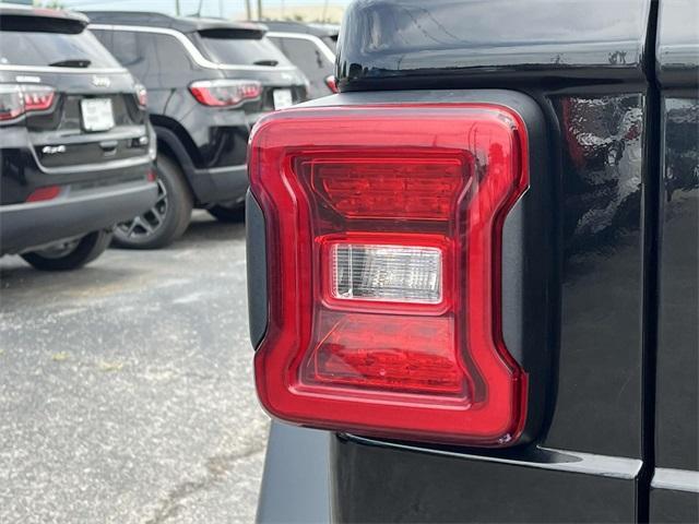 used 2023 Jeep Wrangler 4xe car, priced at $29,861