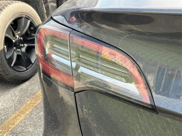 used 2023 Tesla Model 3 car, priced at $30,700