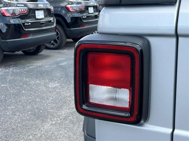 used 2023 Jeep Wrangler 4xe car, priced at $26,202