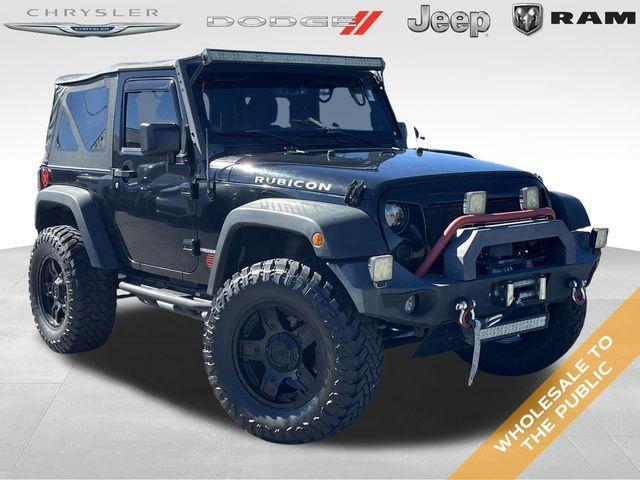 used 2014 Jeep Wrangler car, priced at $12,899
